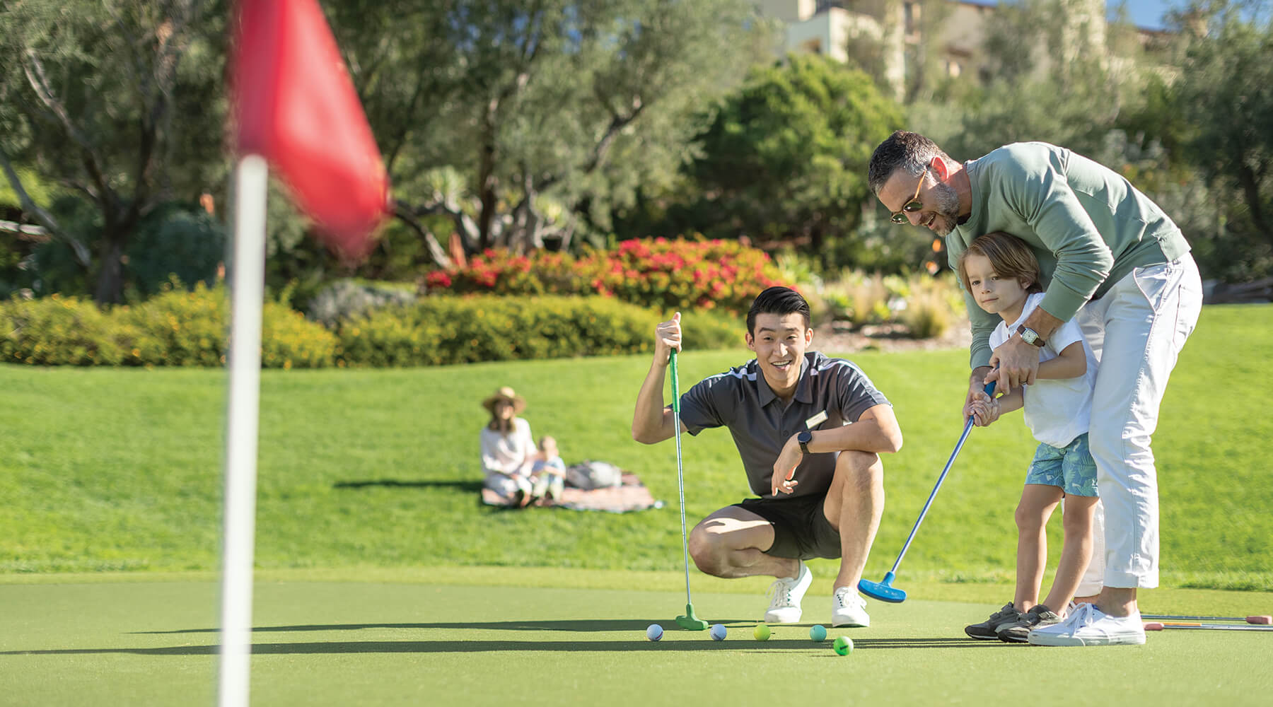 Owner and associate playing golf